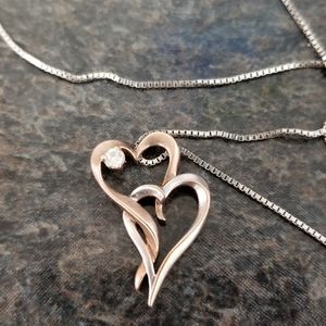 10kt rose gold and yellow gold entwined heart necklace with diamond